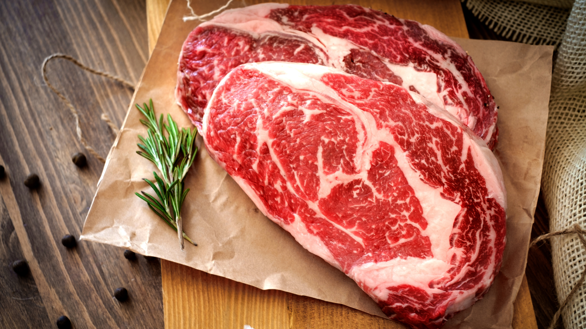Marbled ribeyes on butcher paper